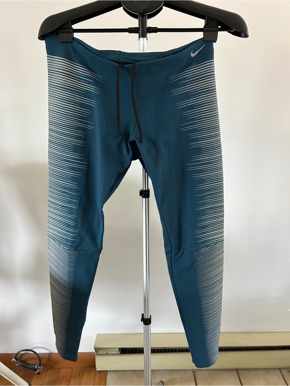 Nike Blue/Teal Dri-FIT Performance Leggings with Black Drawstring.